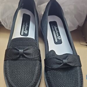 Skechers Black Women's Flats with Bow